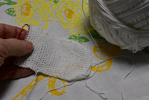 Aprons,  Knitted bandages and Moving Again